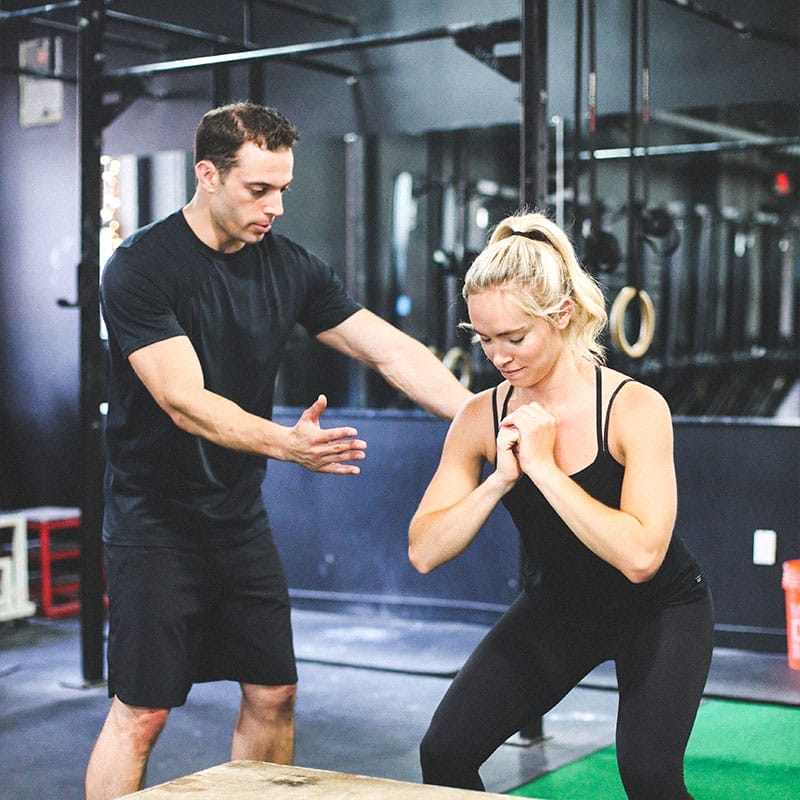 Woman workout with a coach on personal training